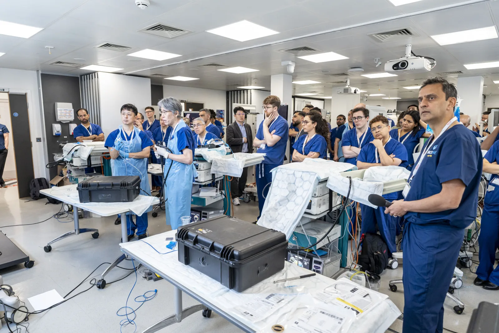 Clinicians taking part in a live endoscopy training session